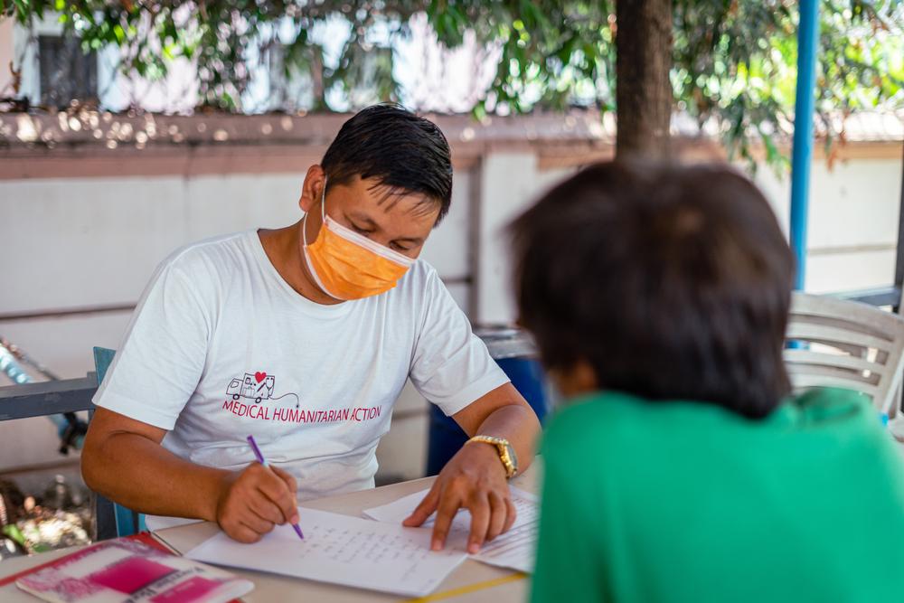 A man receives a consultation at the Doctors Without Borders office in Yangon