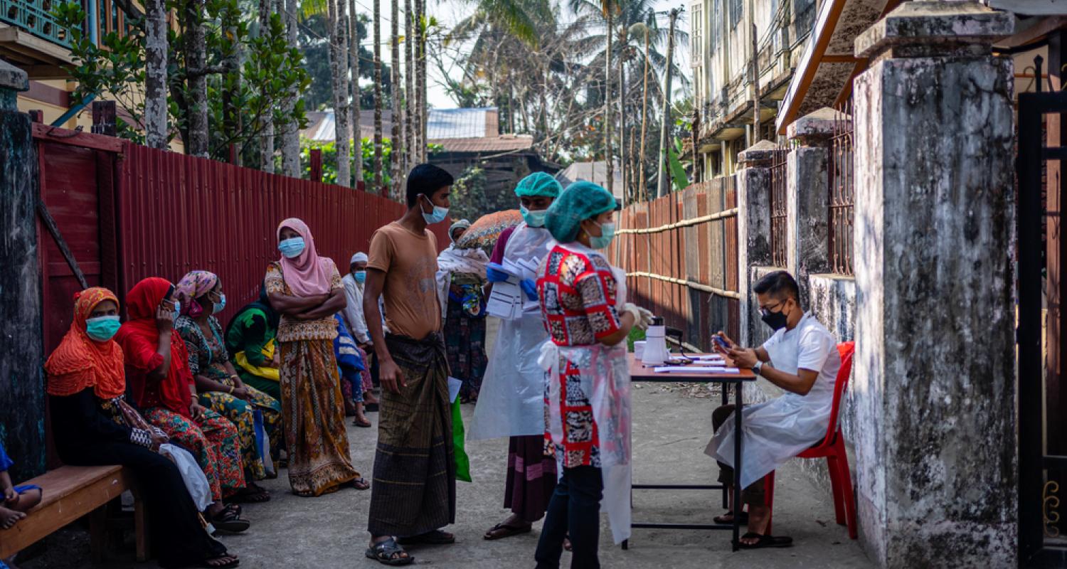 Patients arrive at Doctors Without Borders' clinic in the Aung Mingalar ghetto in downtown Sittwe. Myanmar, 2022. © Ben Small/MSF