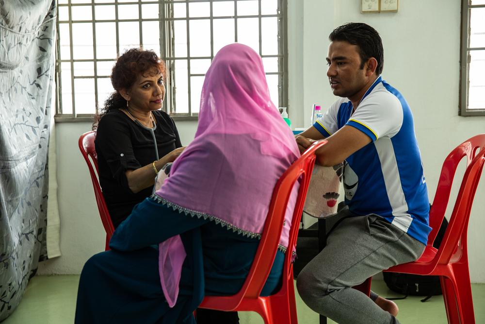 A Rohingya patient has a consultation at MSF’s mobile clinic, accompanied by a translator. Bukit Gudung, Penang.