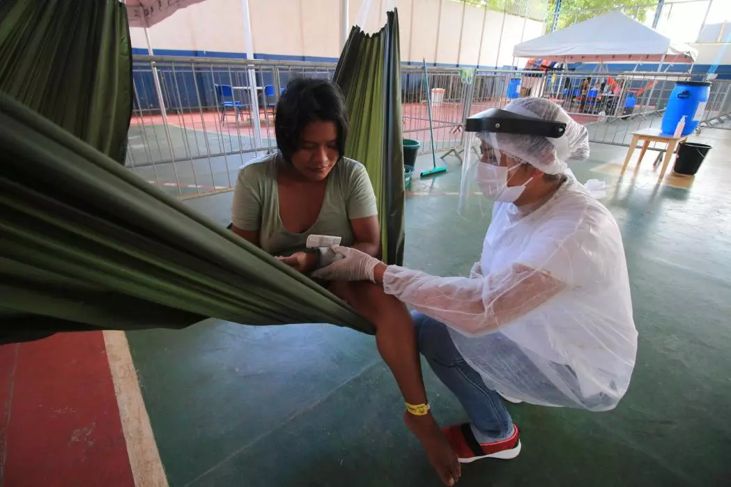 The Warao indigenous people have their blood pressure checked in an isolation center run by MSF in Manaus.