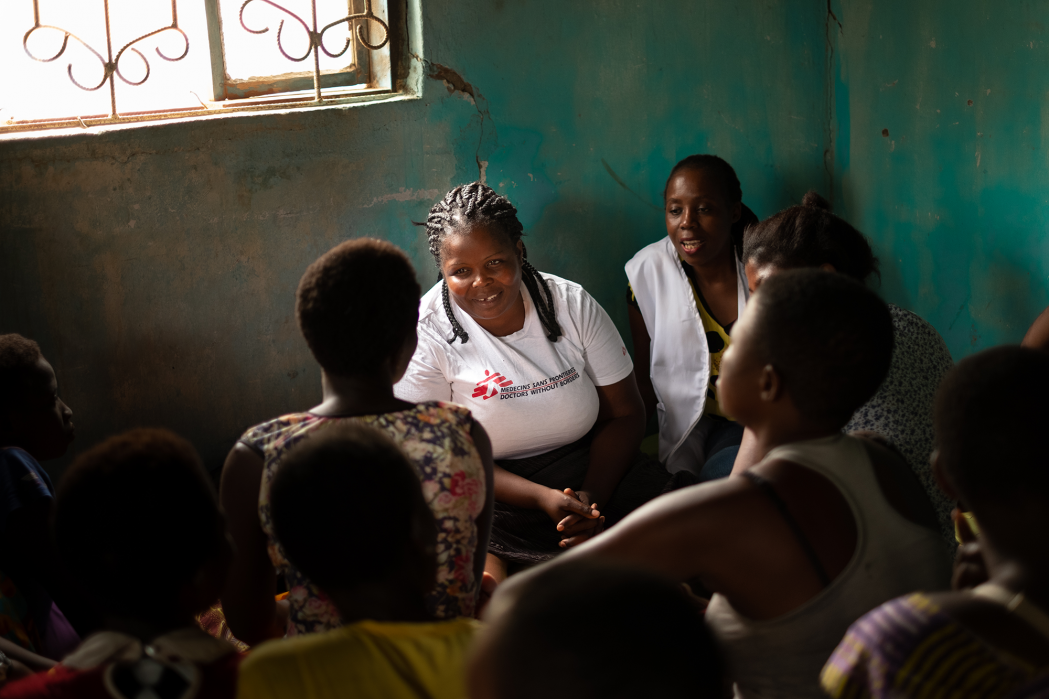 MSF health workers speak with a group of sex workers in Nsanje, Malawi, during a ‘one-stop’ outreach clinic in 2019. These clinics take place in different parts of the community on different days and provide a comprehensive package of sexual and reproductive health services and referrals. © Isabel Corthier/MSF
