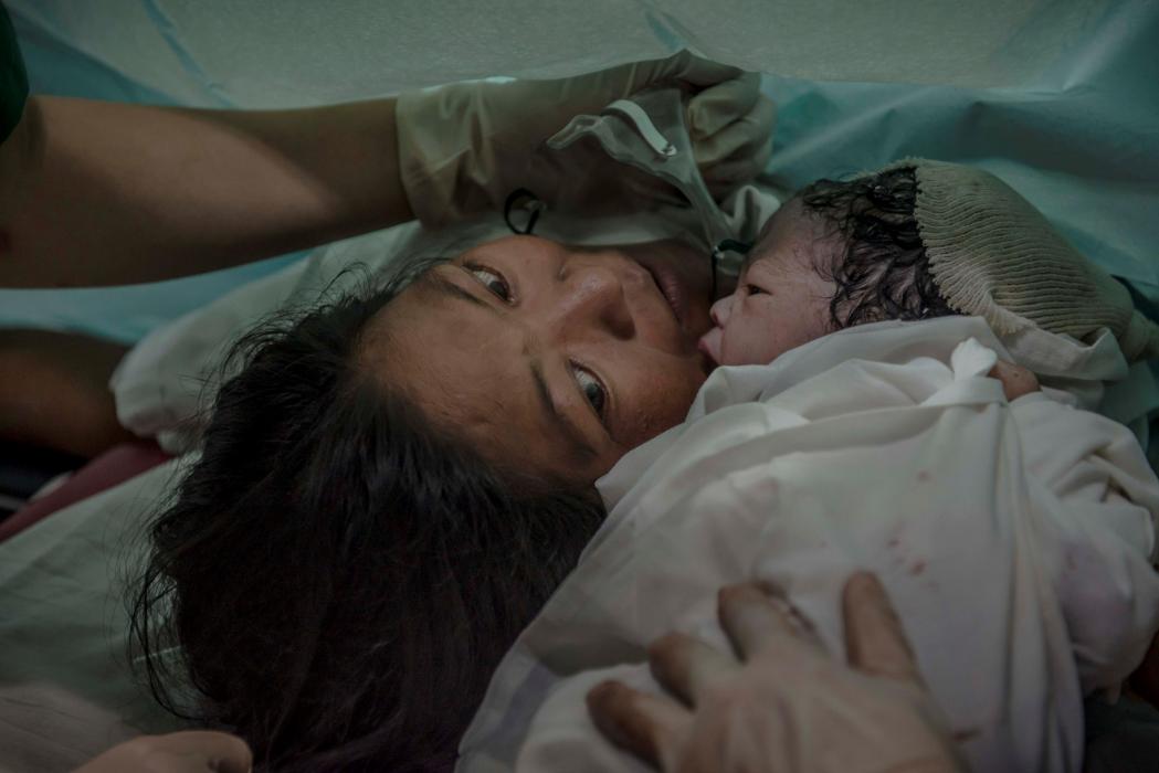 Romy was the first baby born in the MSF inflatable hospital in Tacloban, the epicenter of Typhoon Haiyan. © Yann Libessart