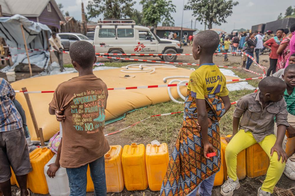 MSF provides drinking water in the town of Sake in order to avoid a waterborne disease's outbreak after the arrival of thousands of displaced people. 