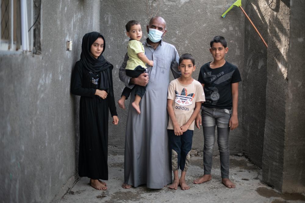Ihsan, a multidrug-resistant (MDR-TB) patient, posing with his family. Since February 2021, Ihsan was declared not contagious, and since then, he doesn't have to isolate himself anymore from his family.