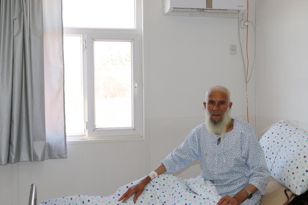 A COVID-19 confirmed patient, pictured in the COVID-19 Treatment Centre in Gazer Ga, Herat. 2021