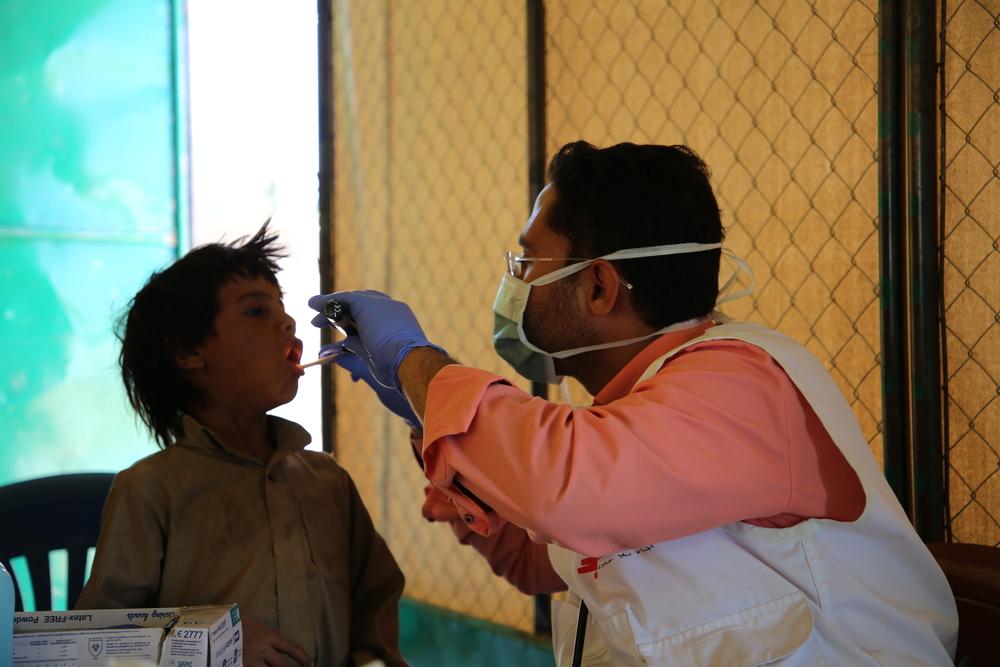 A Doctors Without Borders' doctor doing a checkup on patient at Sabran camp in Marib. Doctors Without Borders providing primary healthcare through mobile clinics targeting IDPs, migrants, marginalised and minority group that suffers discrimination and social exclusion in Yemen