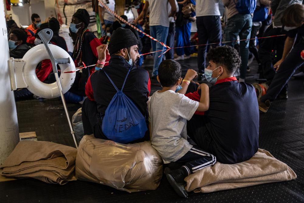 Moustafa (not his real name) and two of his sons are getting ready and waiting to disembark on November 19, 2021.