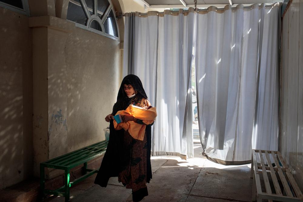 MSF’s Inpatient Therapeutic Feeding Centre (ITFC) at Herat Regional Hospital. Only women, except the staff, are allowed to enter in the facilities. The gate is hidden by a large curtain, the "parda" in dari (which means curtain).  Afghanistan, 2021. © Sandra Calligaro 