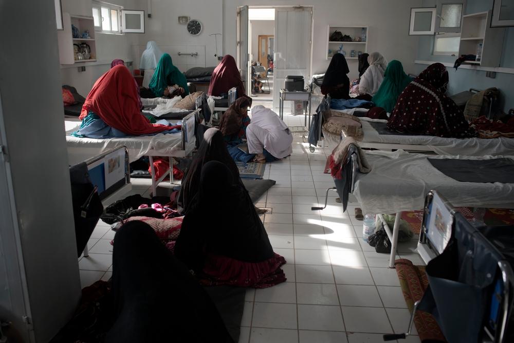 Women and their newborns crowd the beds of the MSF Maternity Hospital in Khost.
