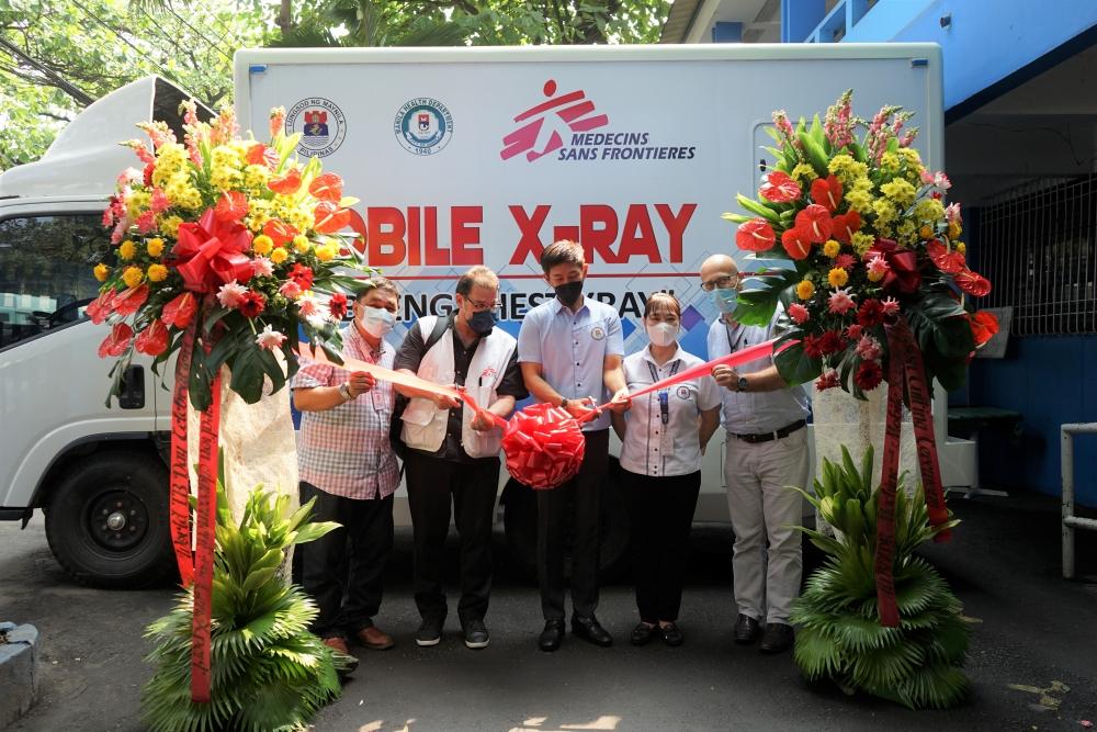 Ribbon-cutting ceremony for the new mobile x-ray truck that will be used for the Doctors Without Borders TB project