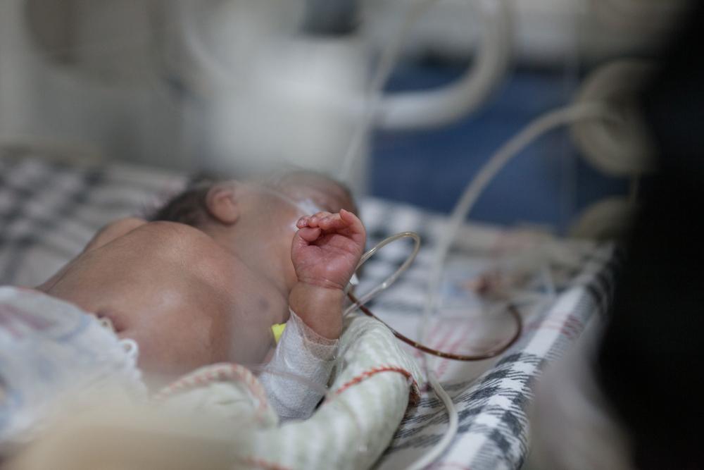 A baby is being treated for infection at the MSF nursery at DHQ Hospital in Chaman, Balochistan.
