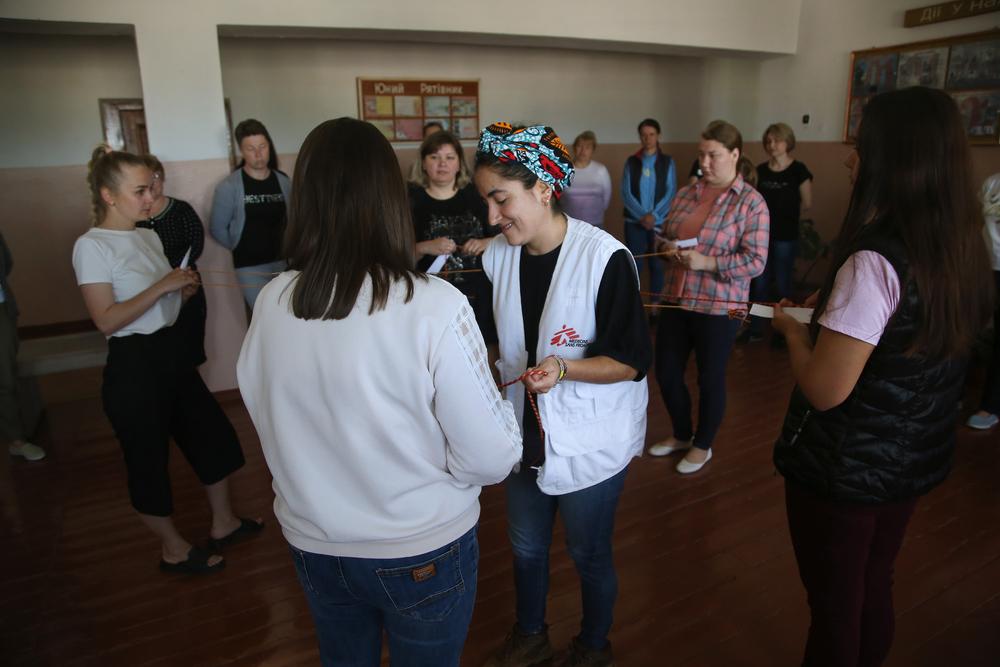 MSF mental health activity manager Ariadna Pérez works with attendees during training about sexual and gender-based violence for psychologists, health staff and first responders at a school in Holovanivsk, central Ukraine
