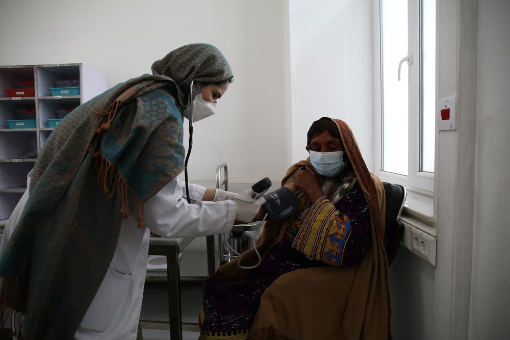 MSF nurse checks a patient's vitals signs in the consultation room on the women's side of the MSF drug-reistant tuberculosis (DR-TB) hospital