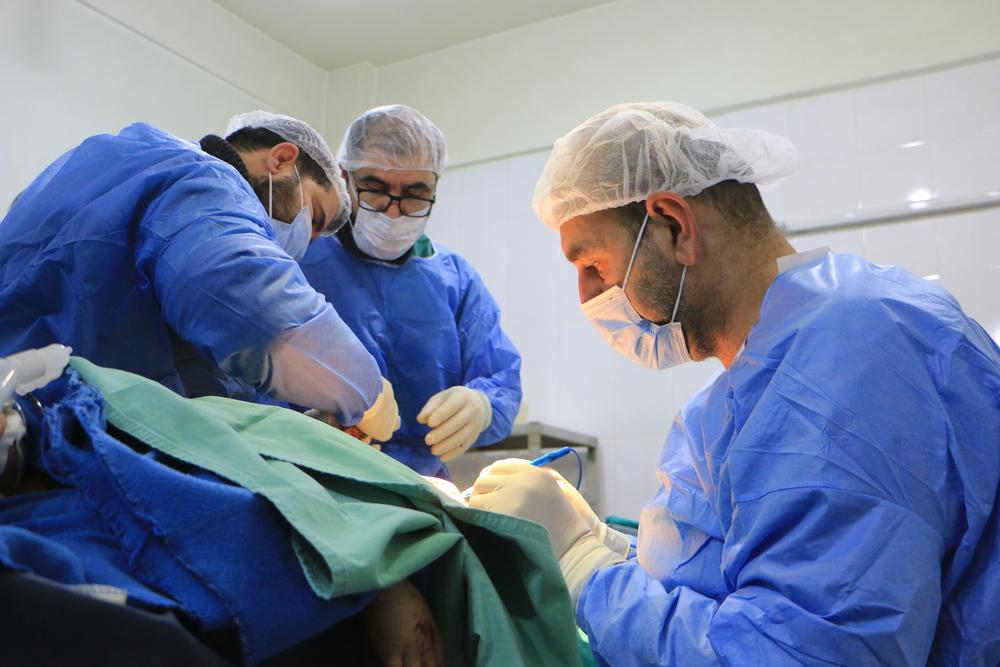 Syrian doctors operate on a patient in a hospital in Atmeh. February 11, 2023. Syria. © Abdul Majeed Al Qareh