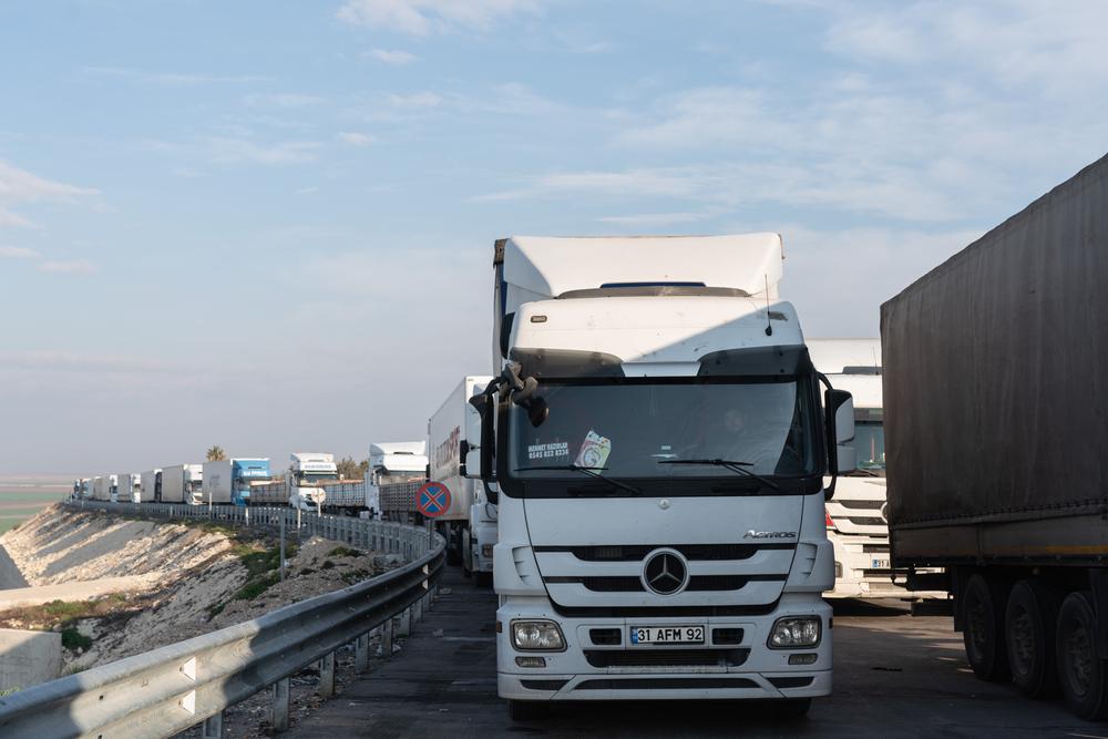 14 MSF trucks loaded with tents and winter kits are crossing to North West Syria, from Hamam crossing point in Türkiye. Turkiye, February 2023. © Abdulmonam Eassa/MSF