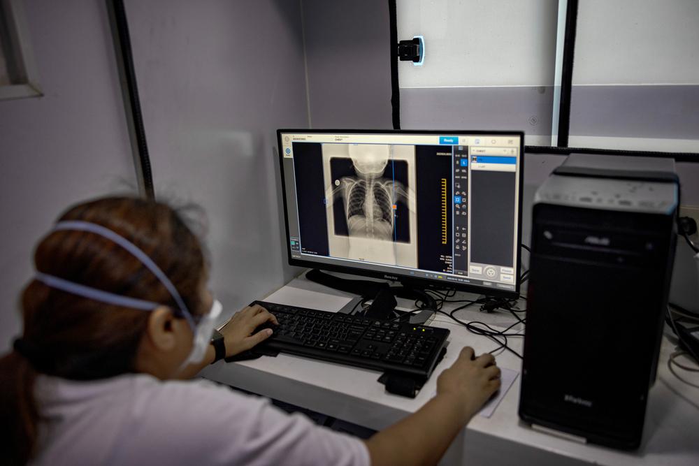 A Doctors Without Borders personnel processes a chest x-ray at one of MSF's active case finding sites for tuberculosis. Philippines, 2023. © Ezra Acayan