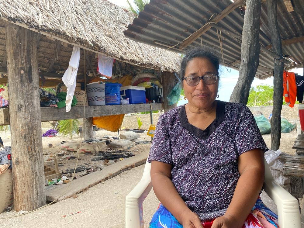a Kiribati resident at Tebikenimwakina community in South Tarawa who have no land to live on, so they build on land that was part of the lagoon. They fortify it with tyres, cement walls and piles of rubbish and palm fronds in a vain attempt to limit damage from king tides.