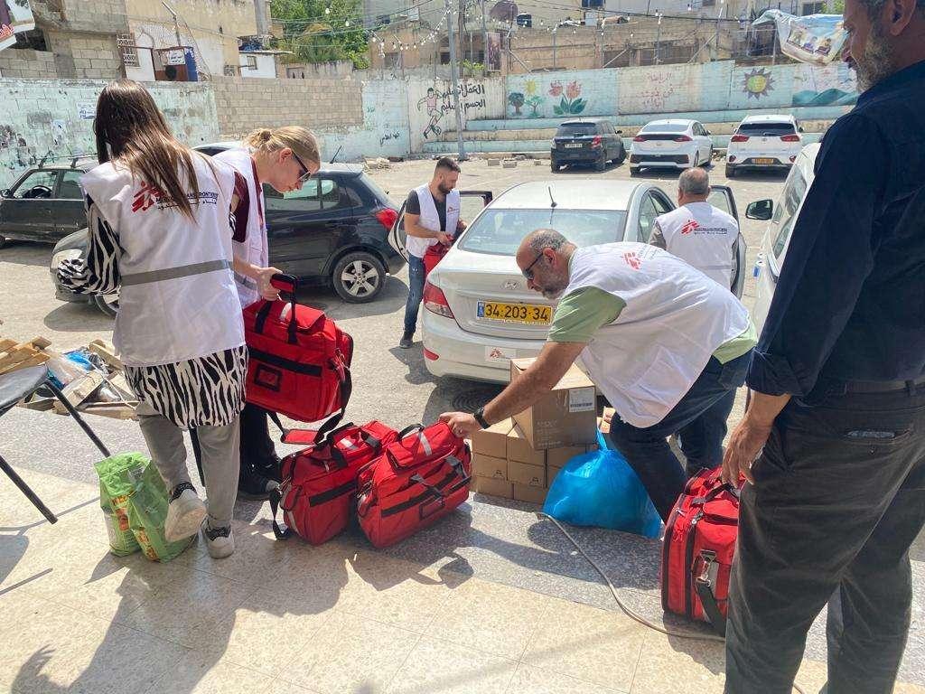 Doctors Without Borders staff deliver emergency and trauma medical supplies in the Jenin refugee camp on June 6, 2023