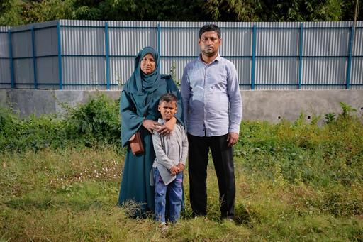Salamatullah, 42, alongside his wife, Subitara, 35, and their son, Mohammad Kawsar, 5, portrays a family bond that withstood separation. Initially embarking on individual journeys out of Myanmar, they found unity once more in the camp at Cox's Bazar, Bangladesh.  