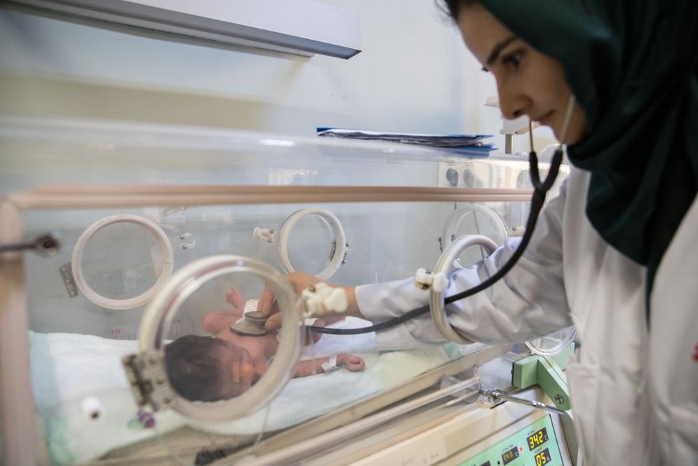Dr Suraya takes 18-day-old baby's vitals, who was born prematurely at seven months. Afghanistan, October 2023. © Oriane Zerah