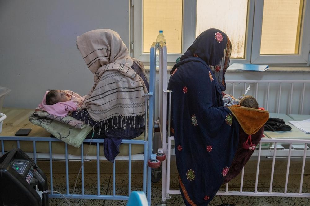 Two mothers carrying their children in the New Natal Ward. Afghanistan, October 2023. © Oriane Zerah