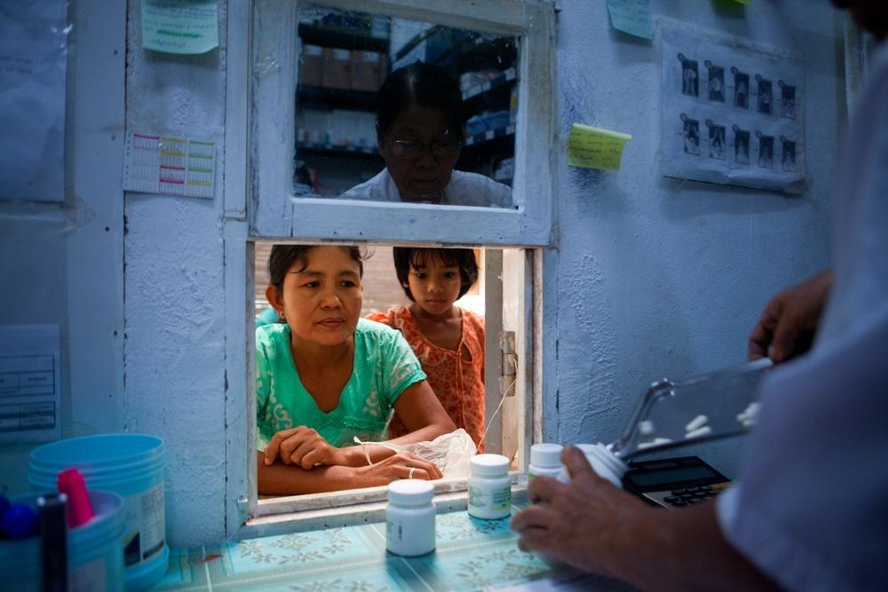 A patient picks up medicines from the pharmacy at the Dawei clinic. Myanmar, September 2012. © Ron Haviv/VII Photo