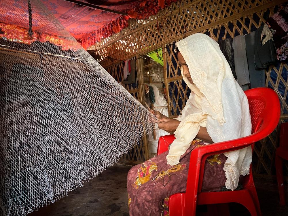 Zainura, 44, crafts fishing nets to earn money and provide food for her family. Cox’s Bazar, Bangladesh, October 2023 © Ishrat Bibi