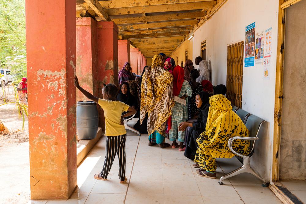 Patients wait outside the Doctors Without Borders clinic in Wad Madani. Sudan, June 2023. 