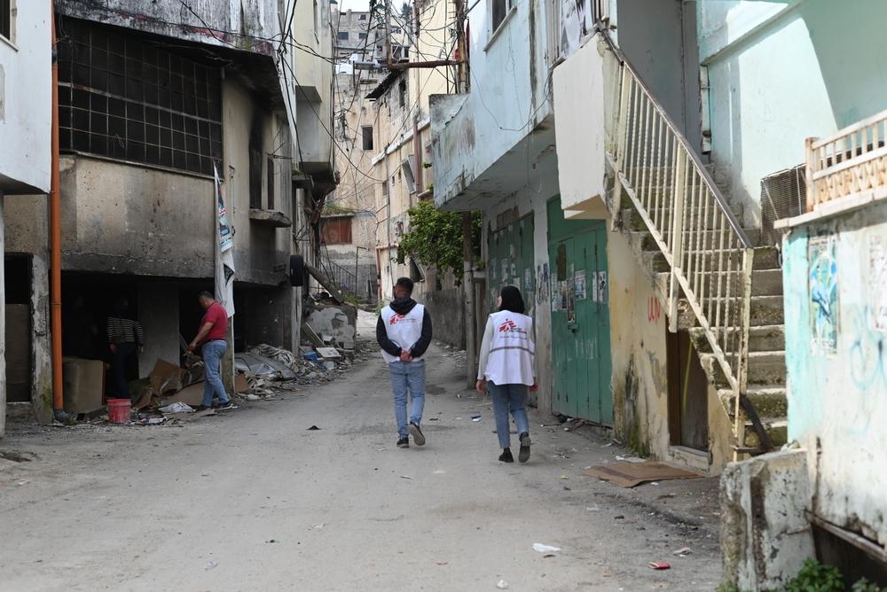 A Doctors Without Borders team walking in the streets of Jenin refugee camp north of West Bank. Palestinian Territories, March 2024