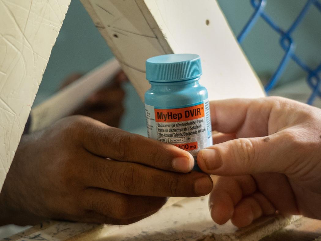 A patient is receiving medicines for Hep C from Doctors Without Borders’ Jamtoli facility at the Rohingya refugee camp in Ukhiya, Cox’s Bazar. Bangladesh, May 2024. © Abir Abdullah/MSF
