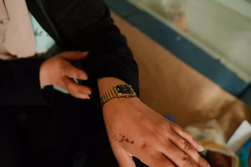 A woman wearing a watch 