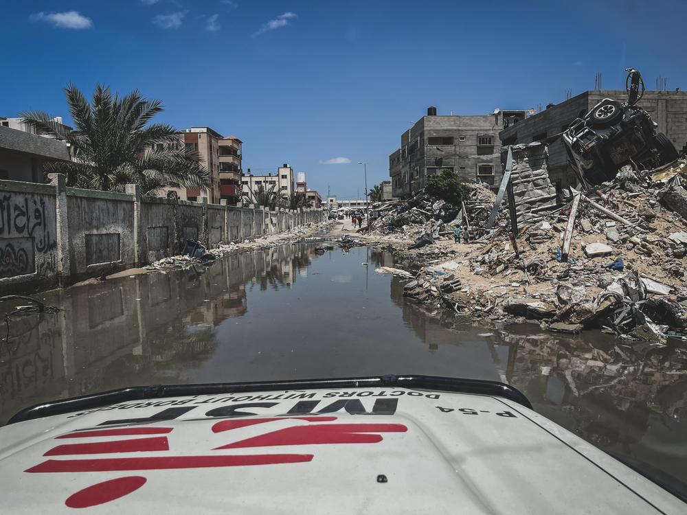 The streets around Nasser Hospital are flooded with sewage. 