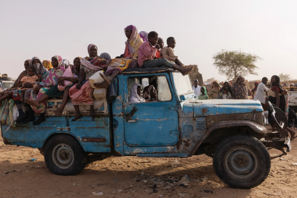 Truck with people crossing the borders. In Adré, MSF stands as the primary provider of water and sanitation, supplying 80 per cent of the camp's water needs.