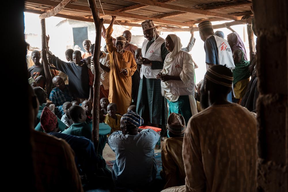 MSF health promotion team conduct a Tom Brown sensitization session for men in Kebbi. Convincing men to support the approach is key as the mostly are the one supplying the family.