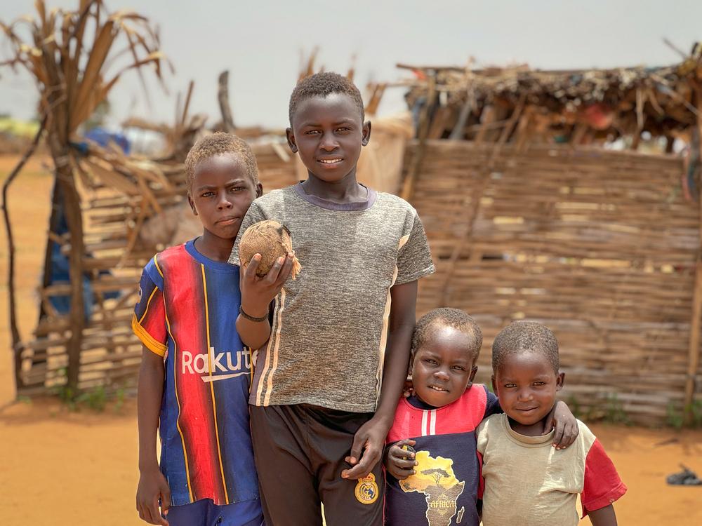 Sudanese boys poses in front of a makeshift in refugee camp in Adre. Chad, July 2024. © Thibault Fendler/MSF