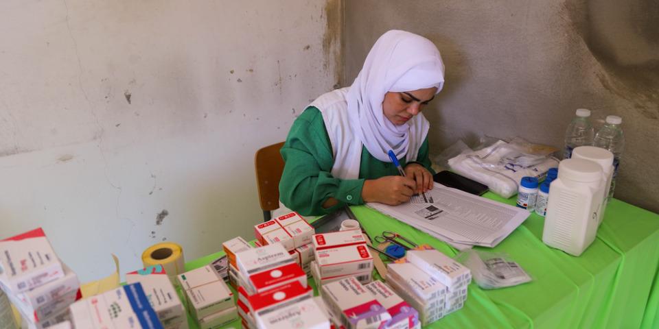 Lebanon MSF dispenser, receives patients after their consultation with the doctor and gives out the prescribed medication.