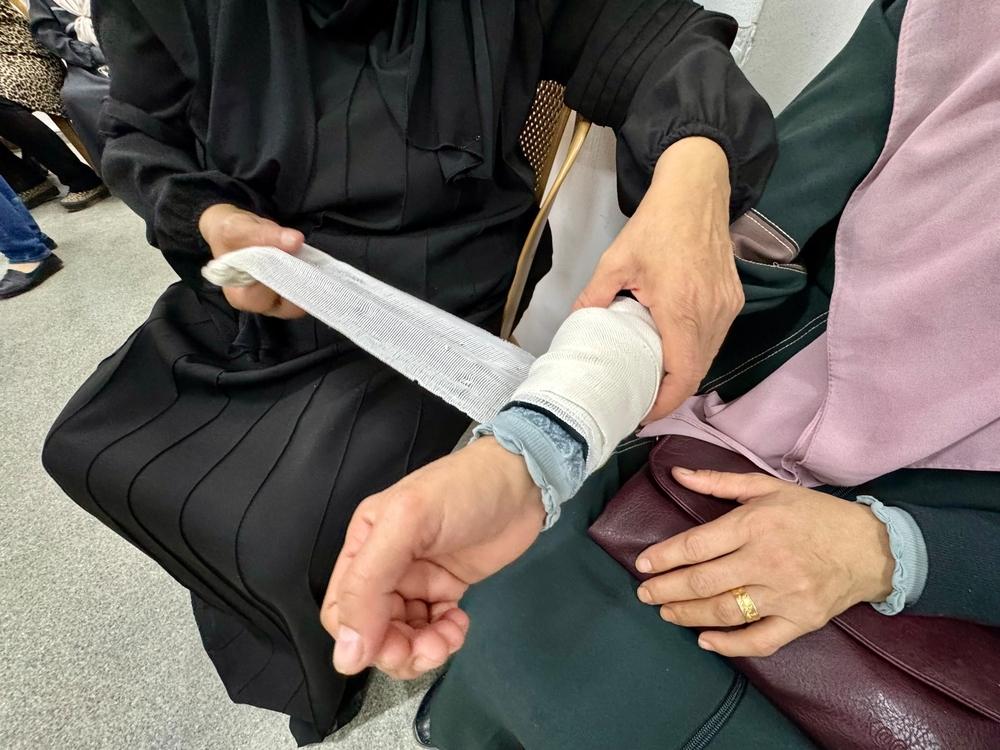 In Nur Shams Refugee Camp, Tulkarem, women trainees practice hands-on techniques for stopping bleeding.