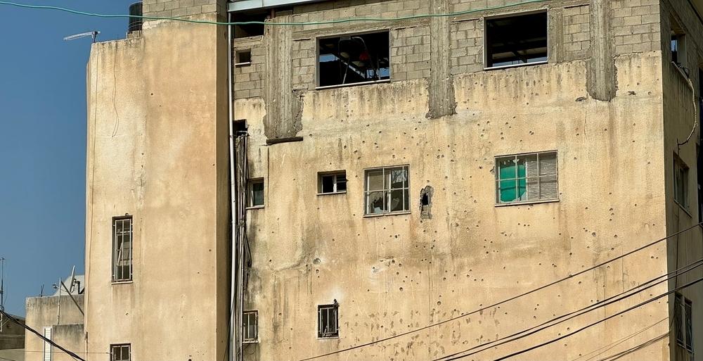 One of the buildings heavily targeted during intense gunfire from Israeli forces in Nur Shams Refugee Camp, Tulkarm, located in the northern West Bank.