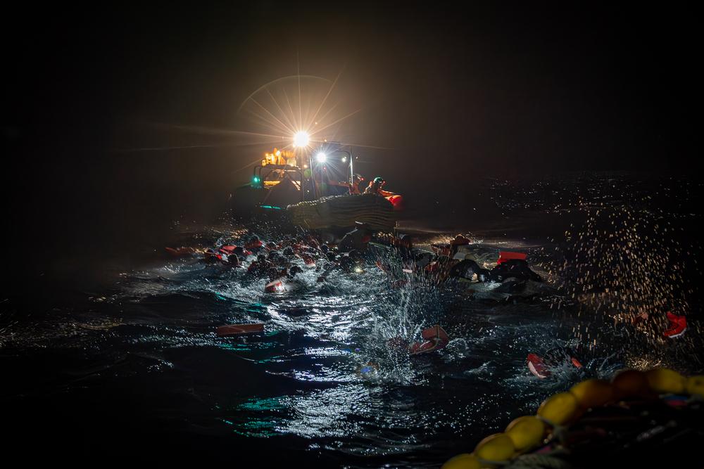 An overcrowded boat capsized during a night rescue by MSF’s search and rescue team.