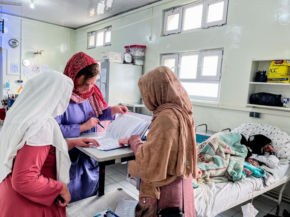 MSF gynaecologists check the medical records of mothers at Khost Maternity Hospital.