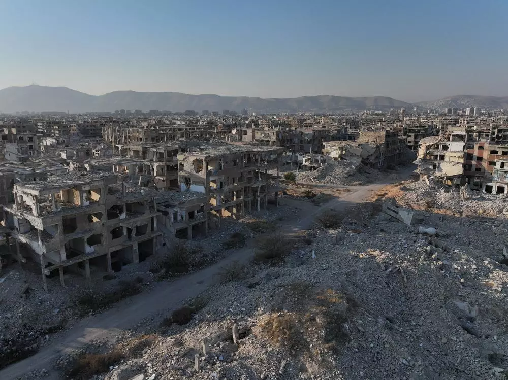 : A scene of destruction showing part of east Ghouta near capital city Damascus, where entire neighborhoods were razed to the ground. In 2013, former Assad forces seized control of the region and turned it into a brutal enclave for over five years. In 2018, Intense bombardment destroyed the area and people experienced huge suffering and resulting in devastating humanitarian crisis.