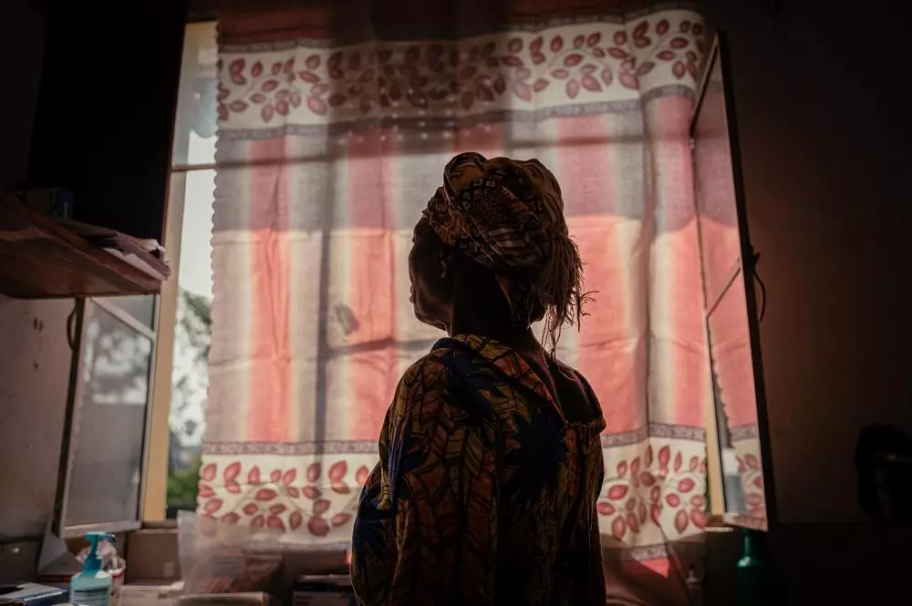 A woman looking out the window