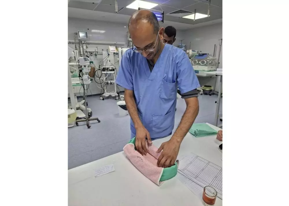 Doctor folding blanket