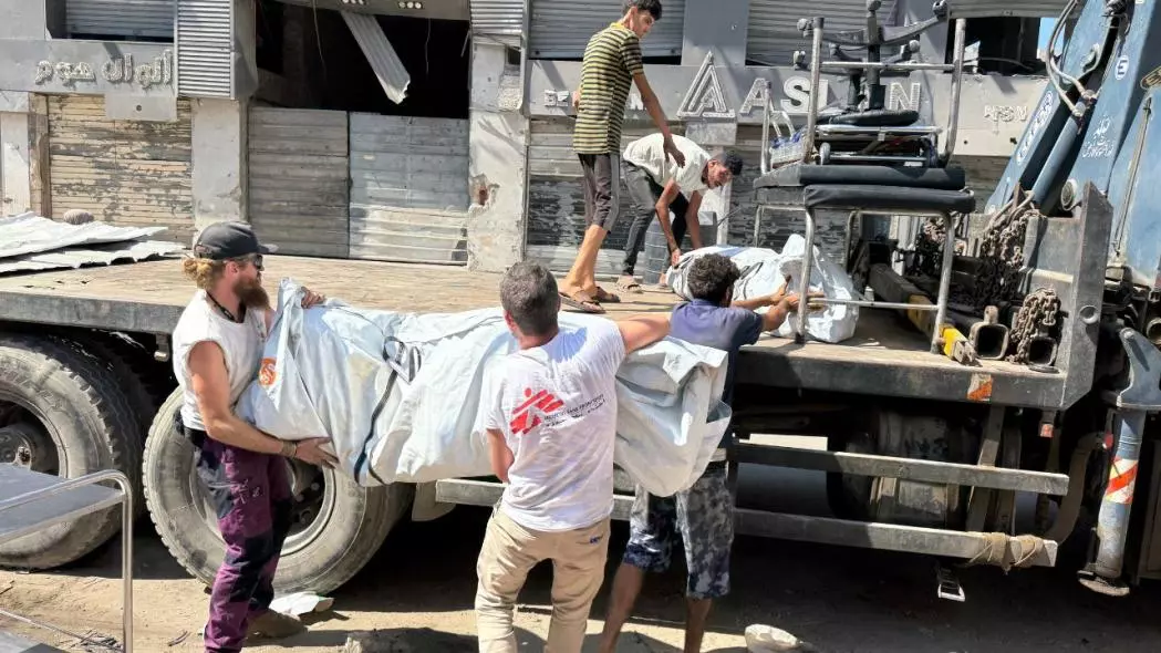 Logistics staff dismantle and evacuate tents often used for triage and overflow, are no longer available to the influx of wounded from continued Israeli airstrikes.