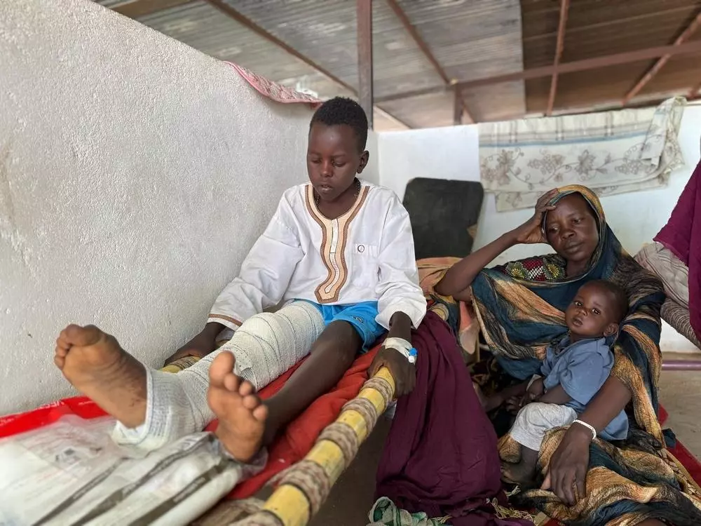 A family sits in hospital