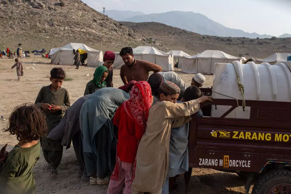 People at water truck