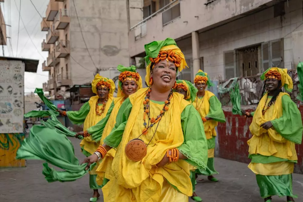 The Ndaorabin Lebou dancers perform during the "Clima Yaakaar" music video shoot 