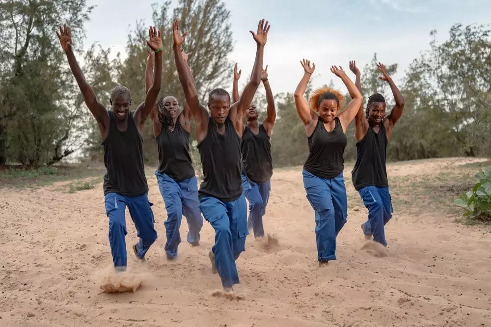 Ecole des Sables dancers perform during the "Clima Yaakaar" music video shoot near Lac Rose