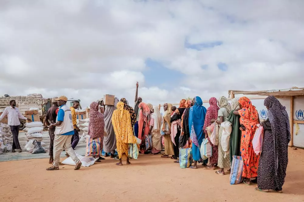 People waiting at soap distribution