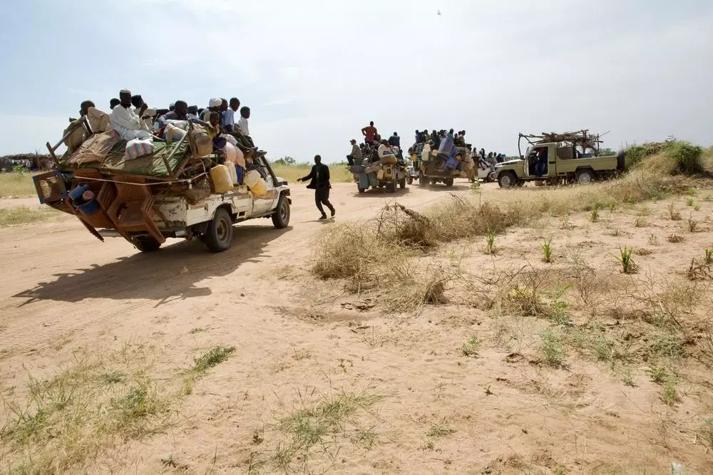 Displaced people from besieged El Fasher arrived at the entrance of Tawila by truck